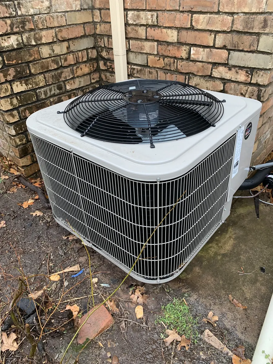 A newly installed outdoor air conditioning condenser at an Oklahoma City home