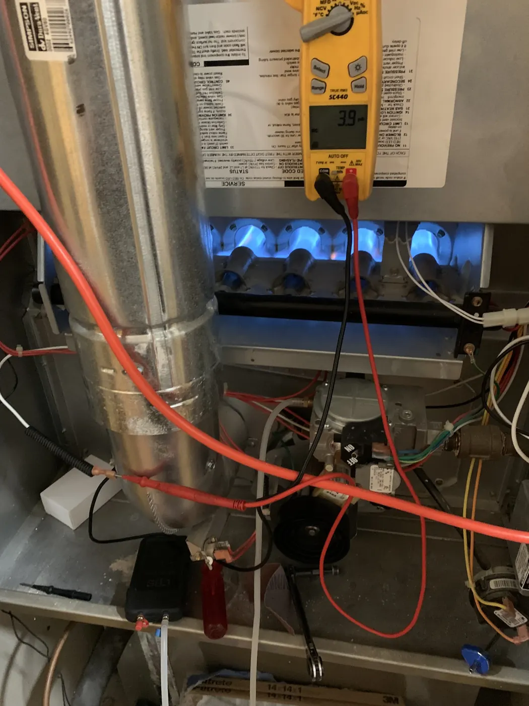 Checking furnace burner operation during a heating repair
