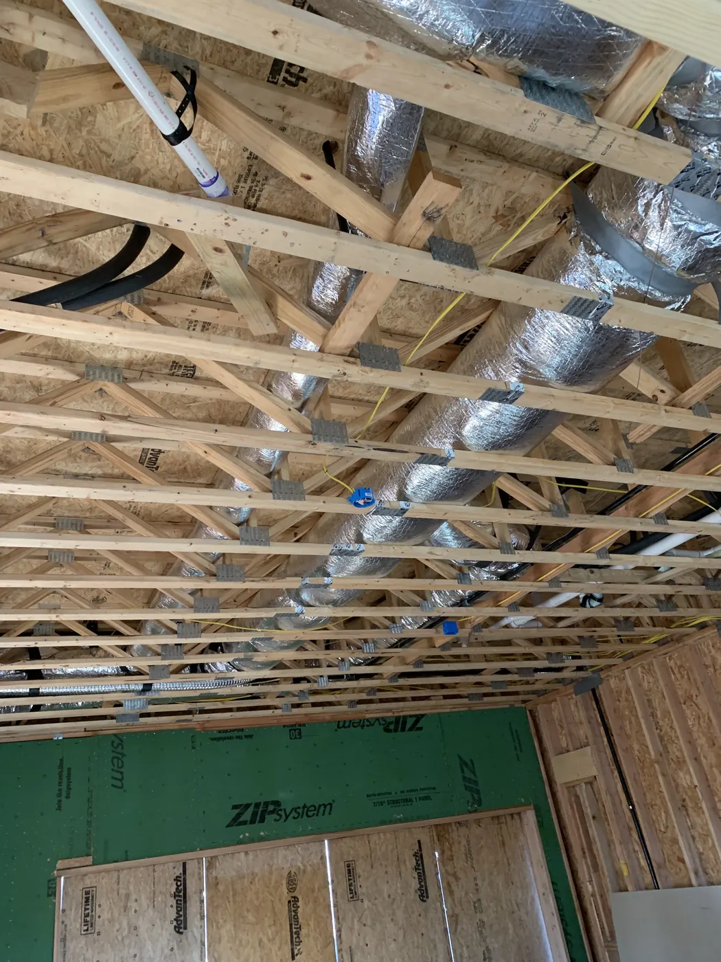 Ductwork installed in a new-construction ceiling